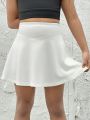 SHEIN Young Girls' Knit Solid Color Shorts With Built-In Safety Shorts For Casual Or Sports Skirt Pants