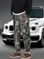Manfinity EMRG Men's Camouflage Printed Loose Fit Jogger Pants With Elastic Cuffs
