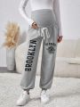 SHEIN Maternity Adjustable Waistband Pants With Printed Text Design