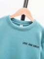 SHEIN Tween Boy Slogan Graphic Thermal Lined Sweatshirt
