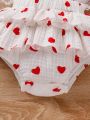 Baby Girl's Heart Pattern Printed Romper With Lace Ruffle Hem
