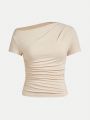 SHEIN Teenage Girls' Solid Color Knitted T-Shirt With Oblique Shoulder Neckline And Ruffled Hem For Casual Wear