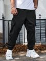 Manfinity Men's Plus Size Flip Cover Pocket Baggy Joggers