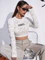 SHEIN Coolane Letter Embroidery Distressed Ripped Crop Tee