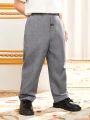 SHEIN Kids Nujoom Young Boy Solid Color Woven Fitted Casual Pants