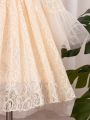 Young Girl's Lace Dress With Ruffle Hem