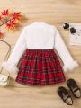 SHEIN Kids Academe Little Girls' Turtle Neck T-shirt With Raw Edged Sleeves And Grid Skirt Two Pieces Set
