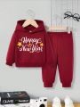 Baby Boys' Casual Hooded Sweatshirt And Pants Set With New Year Slogan, Suitable For Autumn And Winter