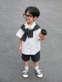 SHEIN Kids KDOMO Toddler Boys' Casual And Comfortable Short Sleeve Shirt With Striped Cape Style And Striped Shorts Set