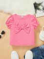 SHEIN Kids FANZEY Young Girls' Ribbed T-Shirt With Puff Sleeves And Bowknot