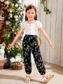 SHEIN Kids EVRYDAY Young Girl's Loose Fit & Elasticized Cuff Woven Floral Printed Casual Pants