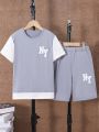 SHEIN Kids EVRYDAY Tween Boys' Color Blocking Letter Print T-Shirt And Shorts Set