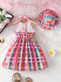 SHEIN Kids SUNSHNE Young Girl Holiday Sleeveless Halter Plaid & Floral Print Dress With Collar & Waist Tie And Hat For Summer