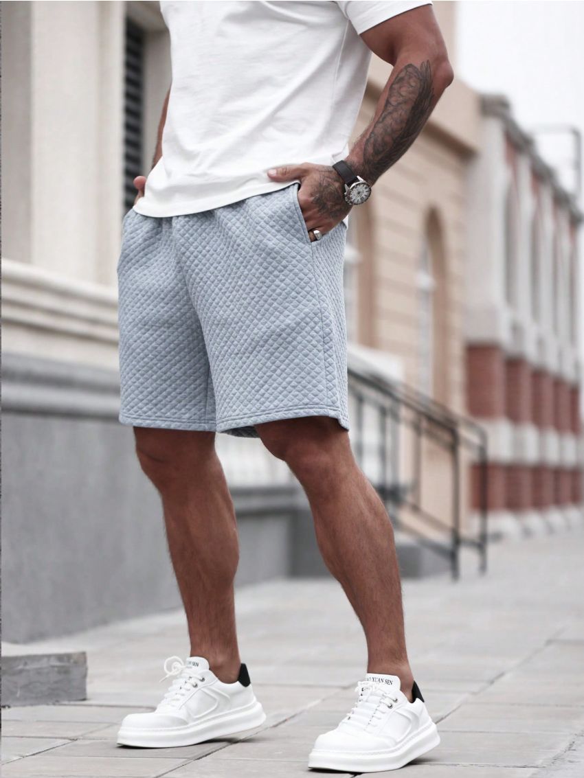 Manfinity Homme Men's Solid Color Elastic Waistband Shorts With Diagonal Pockets