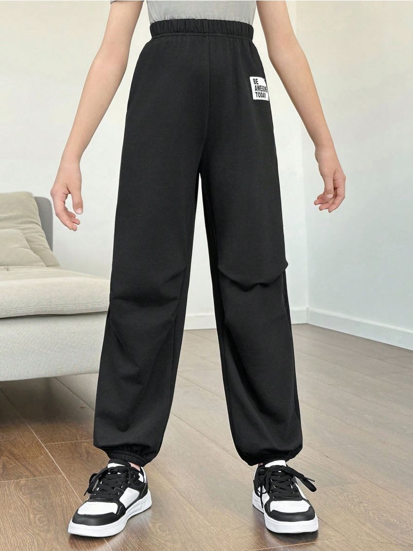 SHEIN Kids SUNSHNE Tween Girls' Knitted Solid-Colored Jogger Sweatpants With Patch Detail, Loose Fit And Elastic Cuffs