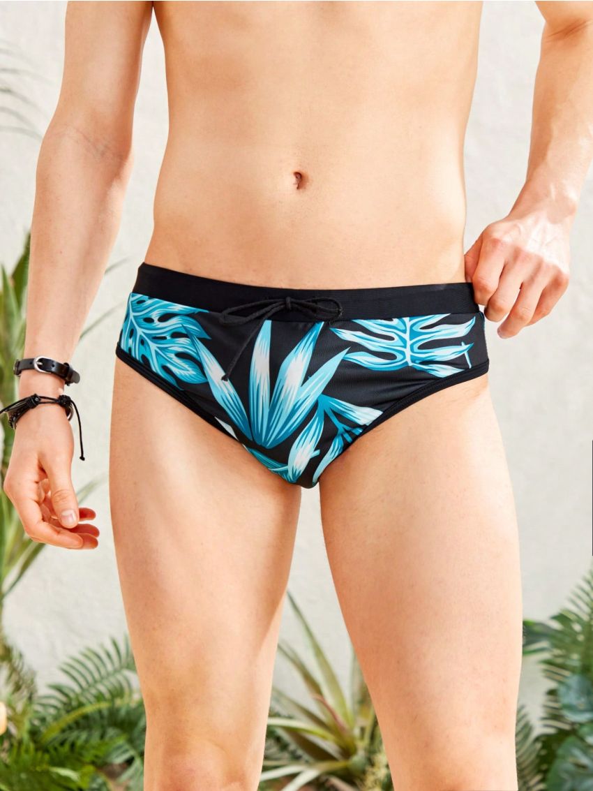 SHEIN Tween Boys' Casual Tropical Print Knitted Triangle Swim Trunks