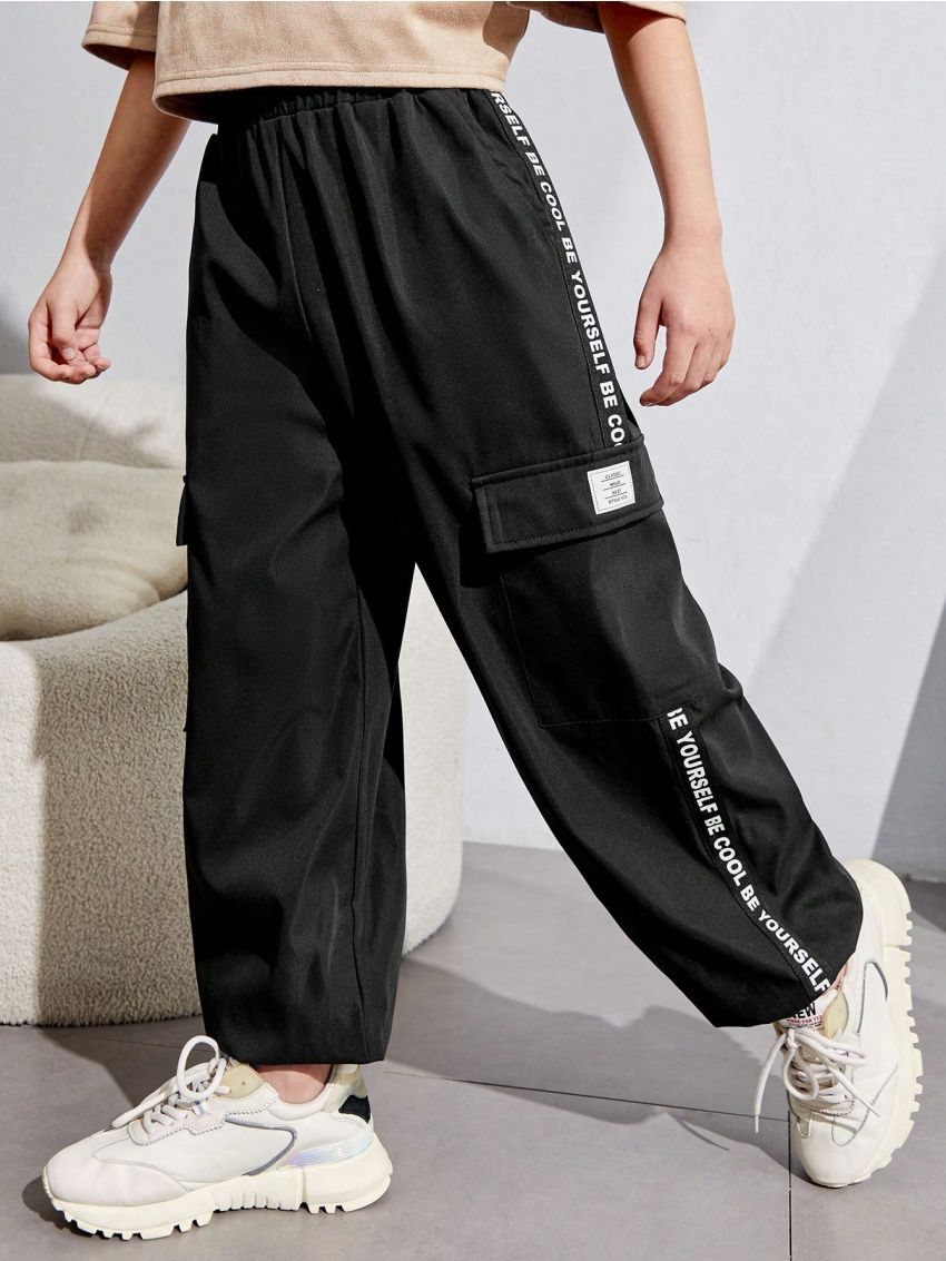 SHEIN Kids EVRYDAY Tween Boys' Casual Resort-Style Loose Woven Trousers With Letter Patch And Three-Dimensional Patch Pockets.