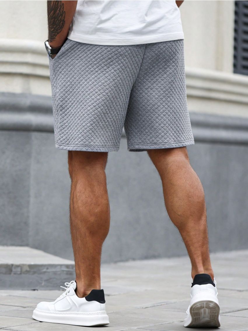 Manfinity Homme Men's Solid Color Elastic Waistband Shorts With Diagonal Pockets