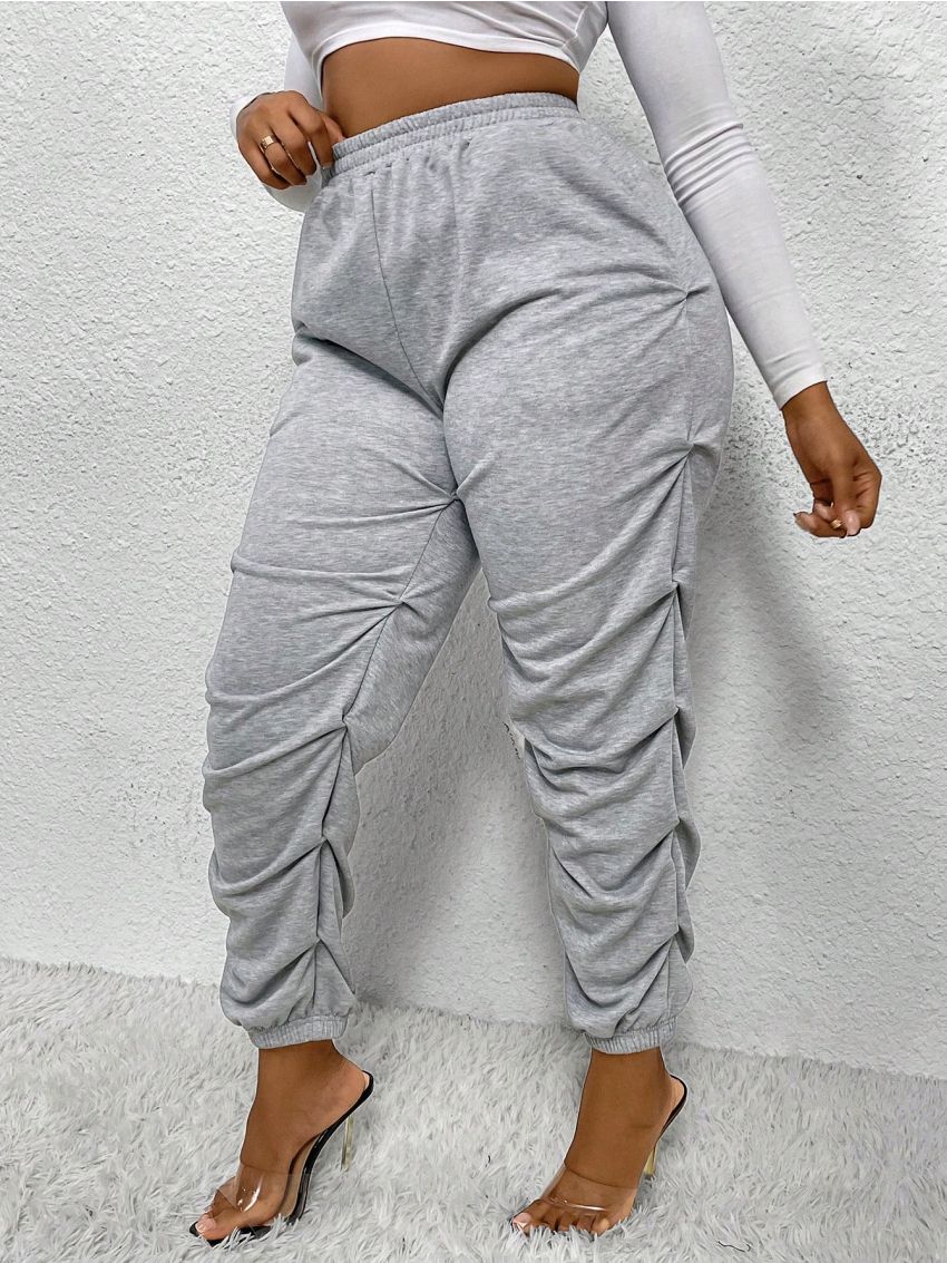 SHEIN SXY Plus Size Elastic Waist Sweatpants With Slanted Pockets