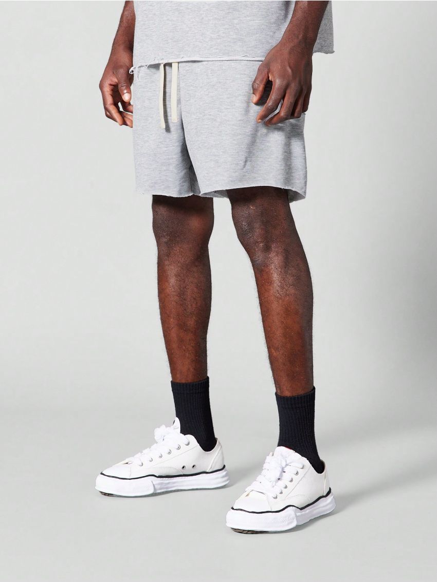 SUMWON Drop Crotch Raw Edge Shorts With Front Applique