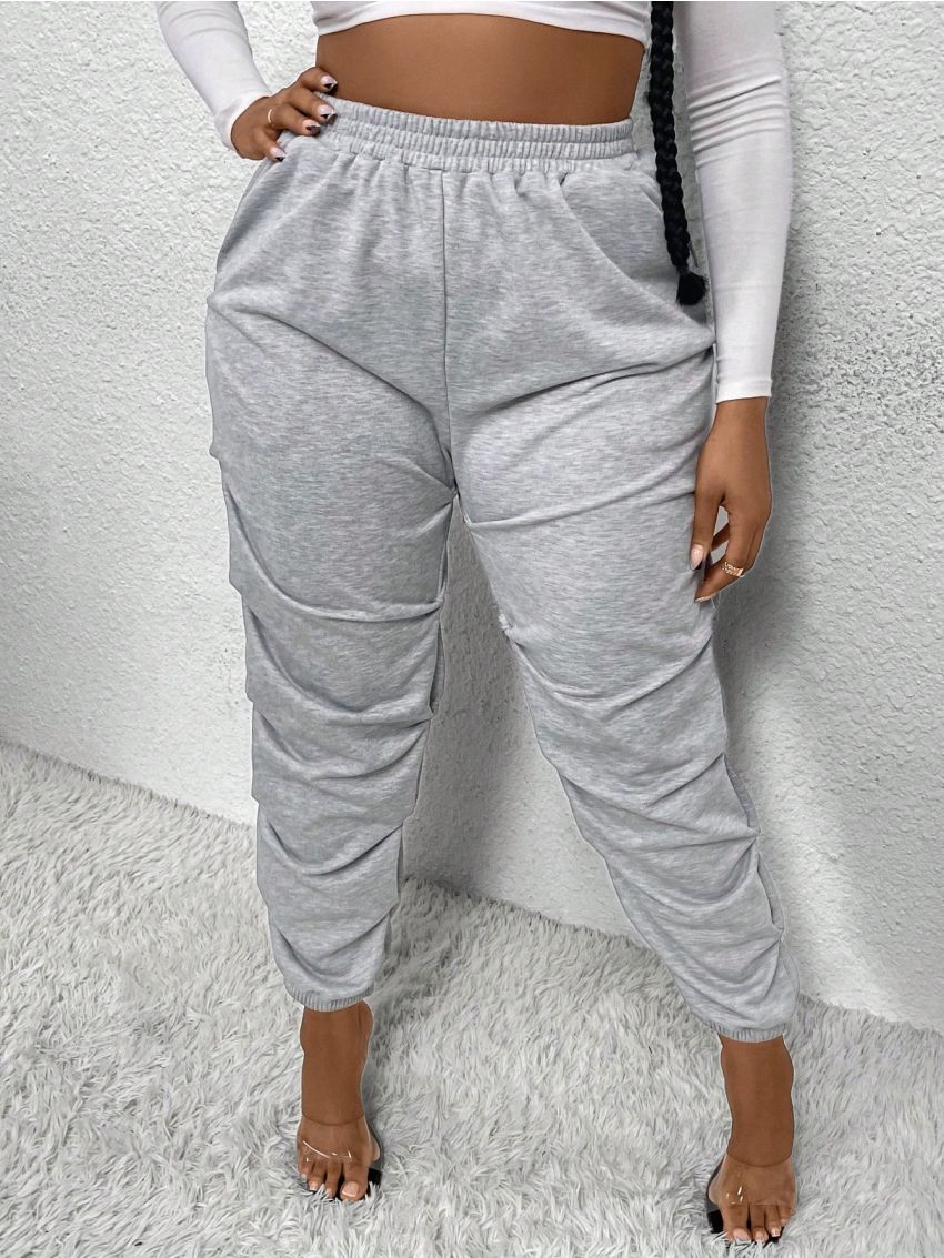 SHEIN SXY Plus Size Elastic Waist Sweatpants With Slanted Pockets