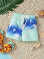 SHEIN Vacation Style Baby Boy's Cute, Casual, Loose Fit, Minimalist Coconut Trees & Ocean Waves Printed Beach Shorts For Summer