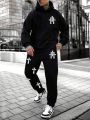 Manfinity EMRG Men's Hooded Sweatshirt And Sweatpants Set With Cross Print And Drawstring