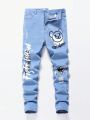 SHEIN Teen Boys' Casual Graffiti And Bear Print Washed High Stretch Skinny Light Blue Jeans For Spring And Summer