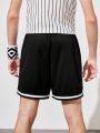 SHEIN Teenage Boys' Casual Color Block Sports Shorts With Letter Print