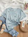 SHEIN Kids Nujoom Tween Girls' Floral Print Short Sleeve T-Shirt, Cute Holiday Round Neck Pullover Top