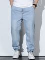 Manfinity Homme Men's Plus Size Light Blue Distressed Jeans With Cuffed Ankles