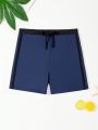 SHEIN Teenage Boys' Colorblock Swim Trunks
