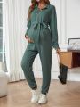 SHEIN Maternity Tie Collar Belted Jumpsuit