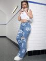 SHEIN Teenage Girls' Floral Printed Youthful Academy Water Washed Casual Bell-Bottom Jeans
