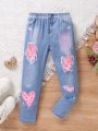 SHEIN Kids KDOMO Young Girl Heart & Slogan Graphic Ripped Denim Effect Print Pants