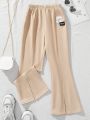 SHEIN Kids SUNSHNE Tween Girl's Solid Color Knit Loose Fit Flared Long Pants For Casual Wear