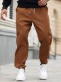 Manfinity Homme Men's Solid Color Drawstring Work Pants