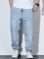 Manfinity Homme Men's Plus Size Light Blue Distressed Jeans With Cuffed Ankles